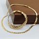 A jewellery set of 14k gold, white gold and red gold A jewellery set of 14k gold, white gold and red gold